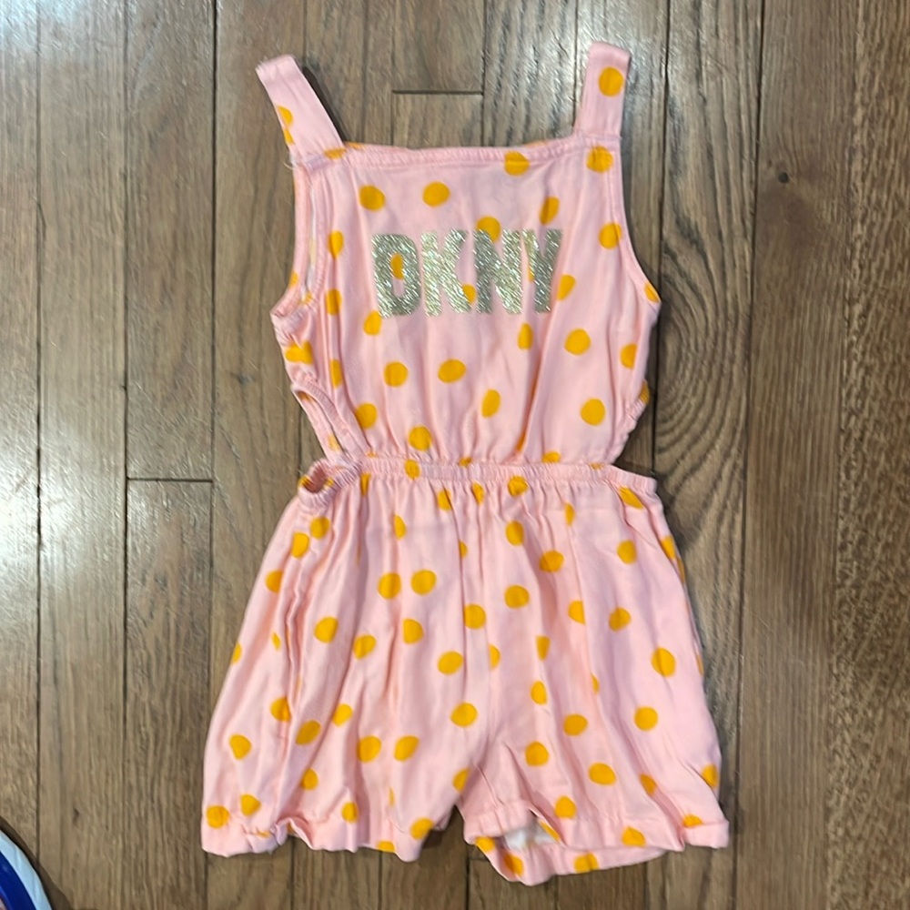 DKNY one piece,side cutouts. Super cute. Bundle and save.